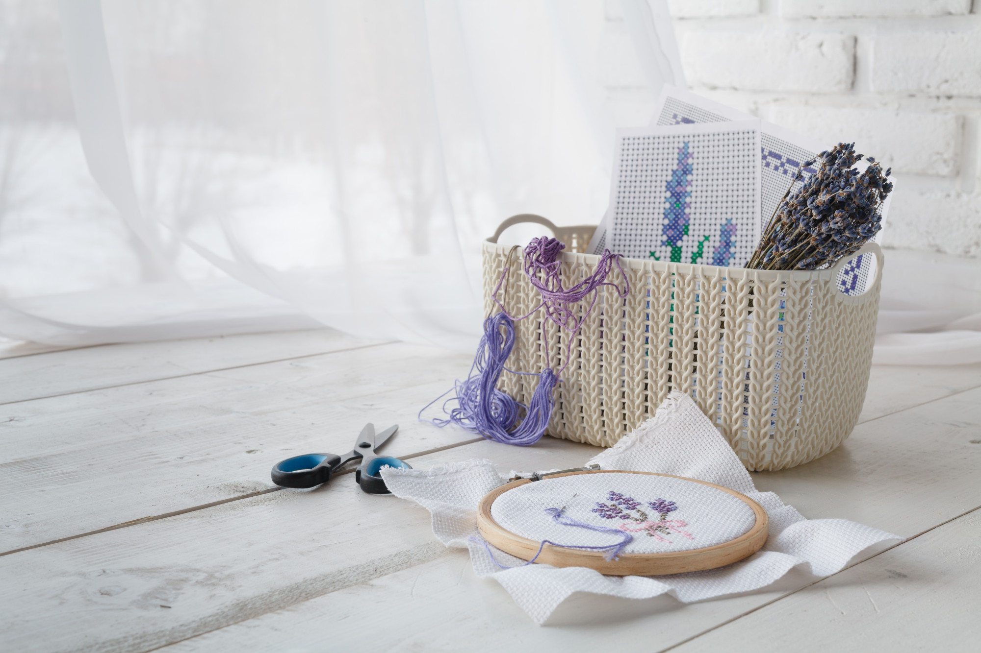 Studio with embroidered sample on wooden table